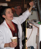 Dr. Suzaynn Schick works on the cigarette smoke aging chamber in her lab