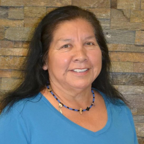 Older woman with long dark hair