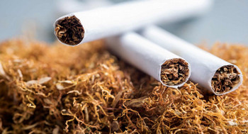 three cigarettes laying down