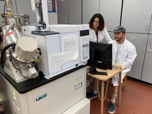 picture of man and woman working in a lab 