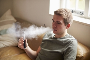 picture of teen boy vaping