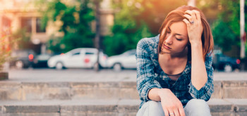 Girl with cigarette thinking